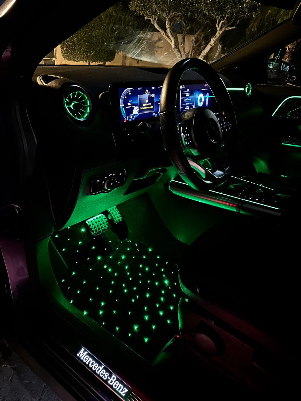 Green starlight car floor mat with ambient fiber optic glow – customizable interior lighting for modern vehicles by CarmatStars