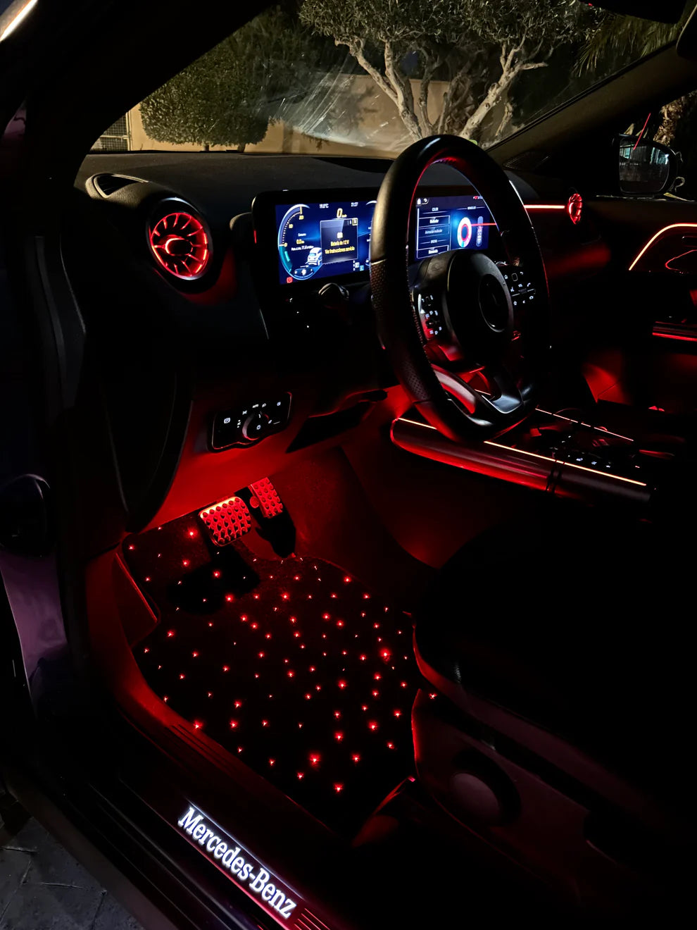 Red glowing starlight car mat with customizable fiber optic lighting – luxury floor mat for car interior by CarmatStars