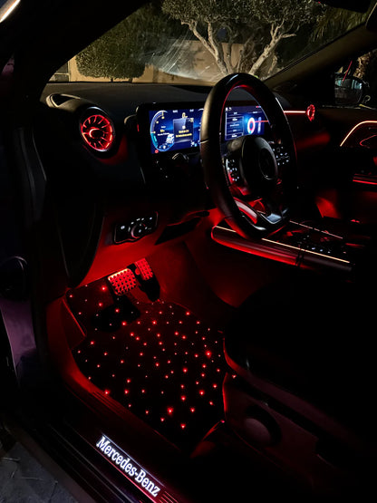Red glowing starlight car mat with customizable fiber optic lighting – luxury floor mat for car interior by CarmatStars